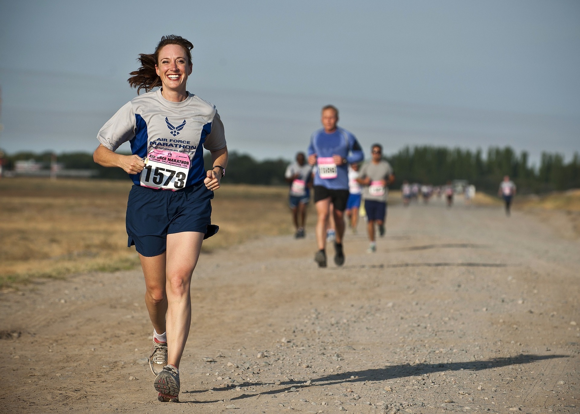 woman running a race