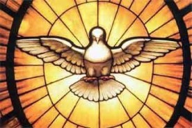 descending dove on yellow stained glass