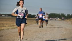 woman running a race