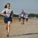 woman running a race